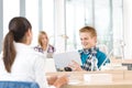 Three high school students in classroom Royalty Free Stock Photo