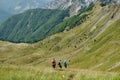 Three Hikers Between Montenegro Mountains Royalty Free Stock Photo