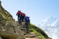 Three hikers in mountains