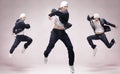 Three hip-hop dancers Royalty Free Stock Photo