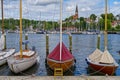 Three historic ships sail in the harbor winterized under cover