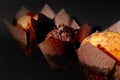 Three Homemade muffins cupcake lies on black background Royalty Free Stock Photo