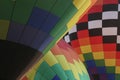 Three hot air balloons inflating side-by-side create an abstract pattern Royalty Free Stock Photo