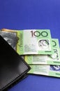 Three hundred Australian dollar notes with wallet - vertical. Royalty Free Stock Photo