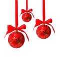 Three hunging red christmas balls isolated