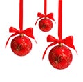 Three hunging red christmas balls isolated