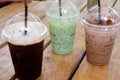 Three ice drink, ice green tea, black coffee and ice chocolate Royalty Free Stock Photo