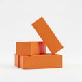 Three Orange Rectangular Blocks Stacked on White Background cubes stacking Royalty Free Stock Photo