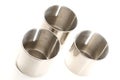 Three identical stainless steel aluminium aluminum cups with no handles