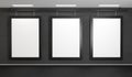 Three images hang on a dark gray concrete wall. Posters template with black frames. 3D rendering mockup for art gallery Royalty Free Stock Photo