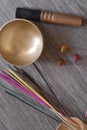 Three incense cones, incense sticks and tibetan bell Royalty Free Stock Photo