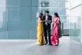 Three Indian business people using a tablet PC indoors Royalty Free Stock Photo