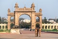 Three Indian policemen taking pictures at the Mysore palace