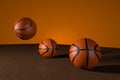 Three indoor basketball balls to play. 3D render, 3D illustration