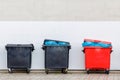 Three industrial Dutch waste containers Royalty Free Stock Photo