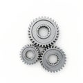 Three interlocking metallic gears in mechanical alignment Royalty Free Stock Photo