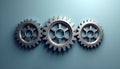 Three Interlocking Steel Gears in a Row Showing Mechanical System and Teamwork Concept on a Teal Background Royalty Free Stock Photo