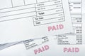 Three Invoices All With Paid Stamp Royalty Free Stock Photo