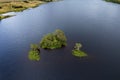 Three island in a close distance in a lake. Connemara, Ireland. Irish landscape scene. Travel and tourism area. Aerial view