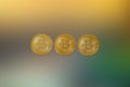 Three isolated bitcoin blockchain coins on geometric texture background Royalty Free Stock Photo