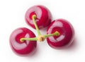 Three isolated cherries top view