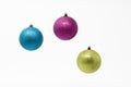 Three isolated Christmas ornamental sparkling balls