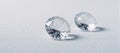 Three isolated shimmering diamonds against a purewhite background Royalty Free Stock Photo