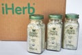 Three jars of seasoning garlic salt Simply Organic brand. Cardboard box iHerb. Bishkek, Kyrgyzstan - 8 Dec 2023