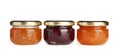 Three jars with tasty sweet jam Royalty Free Stock Photo