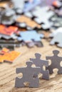 Three Jigsaw Puzzle Pieces on Table