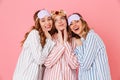 Three joyful girlfriends 20s wearing leisure clothings and sleep Royalty Free Stock Photo