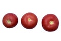 Three juicy red tomatoes on a white background Royalty Free Stock Photo