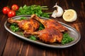 three juicy turkey drumsticks in a smoky marinade on a serving plate