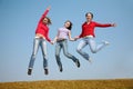 Three jumping girls