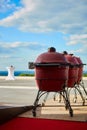 Three kettle barbecue grill with cove