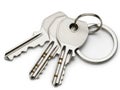 Three keys on keyring isolated on white background Royalty Free Stock Photo