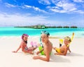 Three kids on the beach Royalty Free Stock Photo