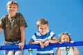 Three kids climbing up Royalty Free Stock Photo