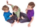Three kids eating ice lolly Royalty Free Stock Photo