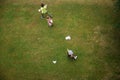 Three kids playing with paper made origami planes Royalty Free Stock Photo