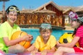 Three kids in the pool Royalty Free Stock Photo