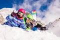 Three kids portrait with ski over mountain and sky Royalty Free Stock Photo