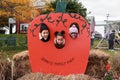 Three kids posing in a pumpkin Royalty Free Stock Photo