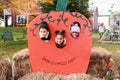 Three kids posing in a pumpkin Royalty Free Stock Photo