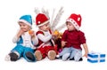 Three kids in Santa hats Royalty Free Stock Photo