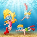 Three kids swimming and diving underwater Royalty Free Stock Photo