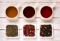 Three kind of tea in cups on wooden table