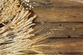 Three kinds of cereals - rye, wheat, oats on a wooden background