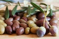 Olives on wooden background, kalamata, kalamon, green olives