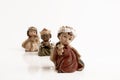 The Three Kings carrying their gifts adoring the Child Jesus. Epiphany day concept. Royalty Free Stock Photo